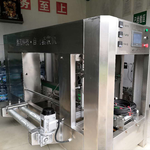 桶裝(zhuāng)水自動套袋機